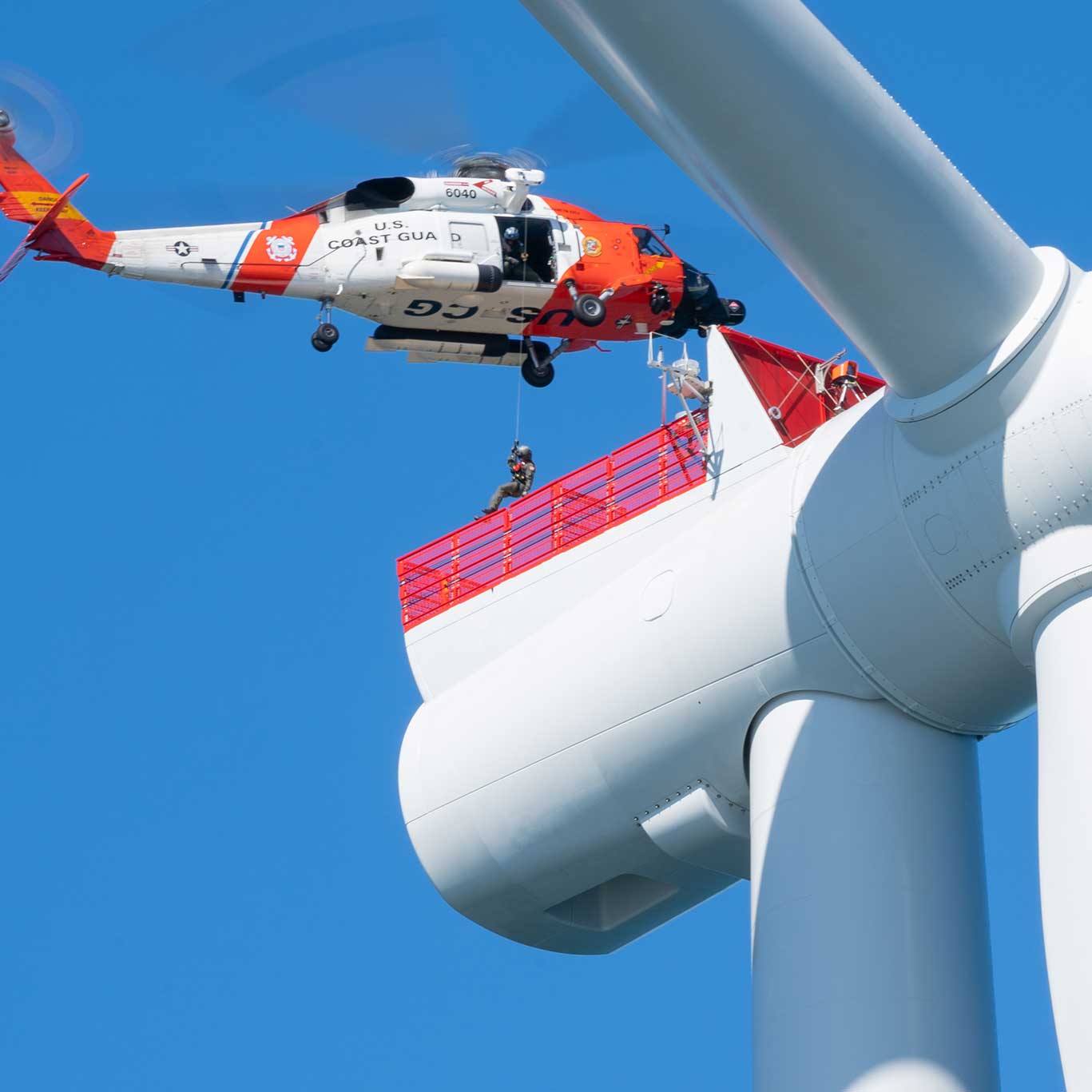 Coast guard circling a windmill